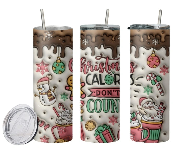 20 oz Christmas tumbler with hot chocolate design, Santa Claus, snowman, candy canes and holiday ornaments. Perfect festive travel cup for Christmas drinks and gifts.